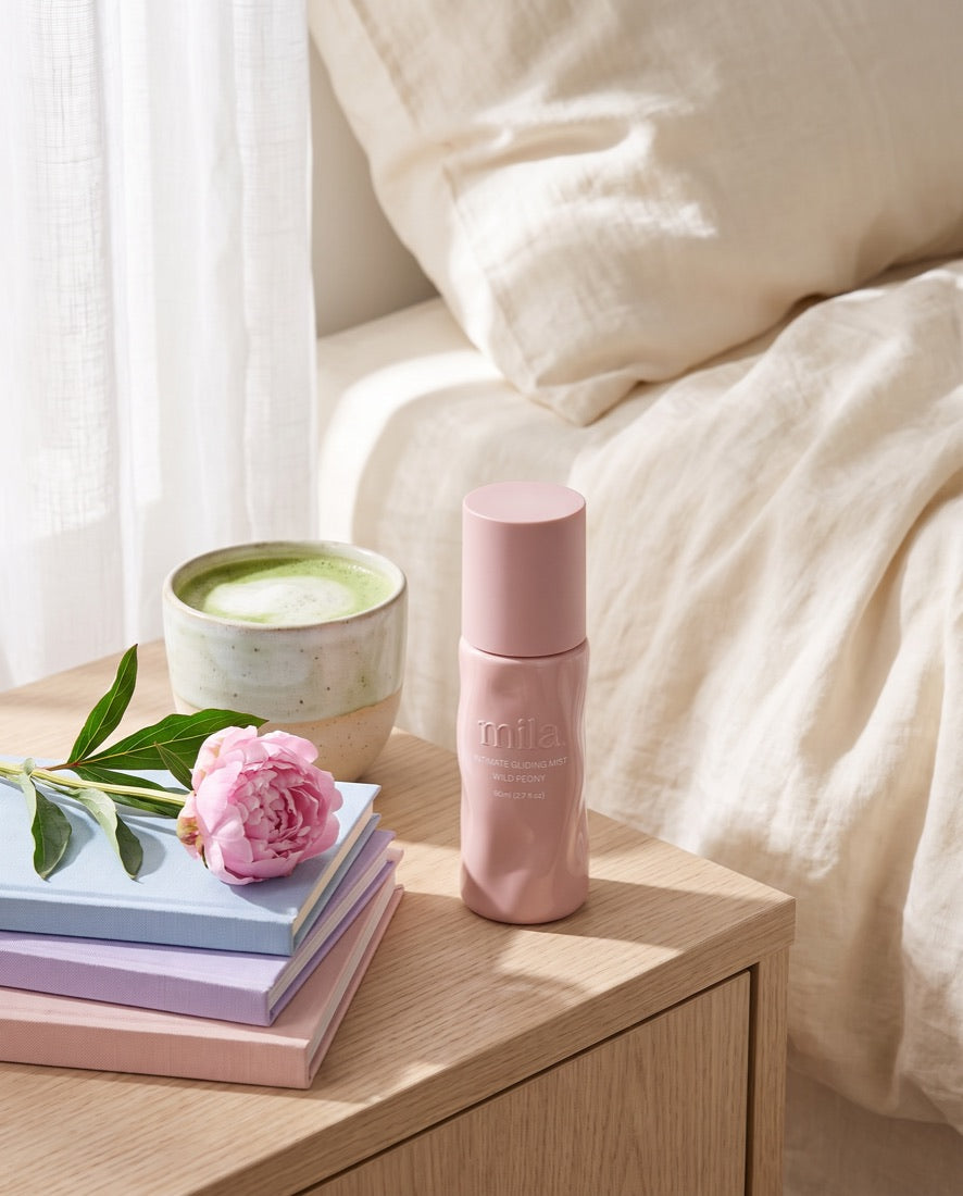 Bloom Wild Peony beside a cup of matcha on a bedside table